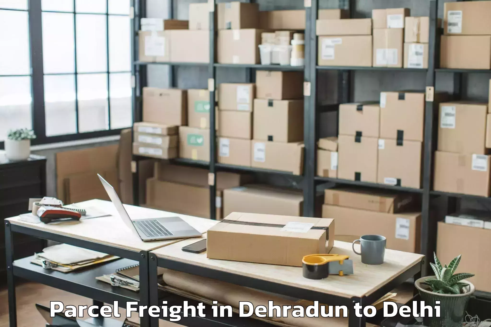 Get Dehradun to Defence Colony Parcel Freight